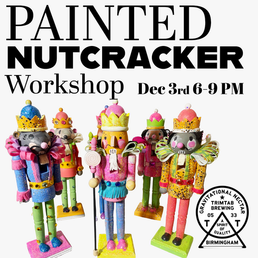 Colorful painted nutcrackers with crowns and glitter displayed in a lineup for the Painted Nutcracker Workshop on December 3rd, 6-9 PM, at Trim Tab Brewing in Birmingham, AL.